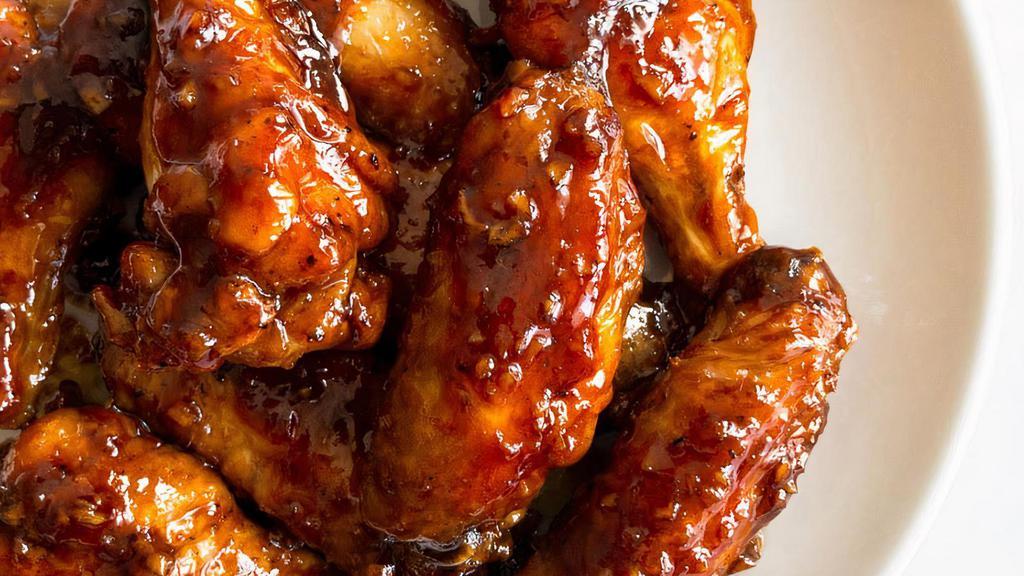 Bbq Wings · Traditional bone-in wings, hand-tossed in your choice of sauce or rub. Choose your flavors!