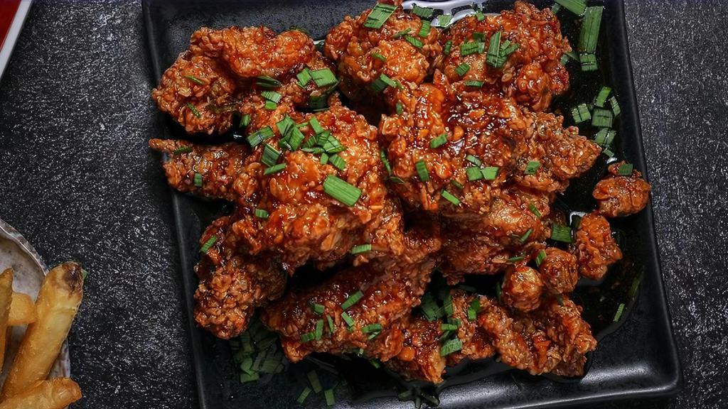Korean Honey Garlic Wings · Traditional bone-in wings, Breded With Flour & hand-tossed in your choice of sauce or rub. Choose 
 your flavors!