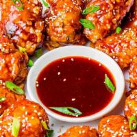 Korean Hot & Sweet Chili Wings · Traditional bone-in wings, Breded With Flour & hand-tossed in your choice of sauce or rub. C...