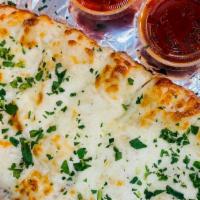 Garlic Bread · Buttery bread that is topped with garlic.