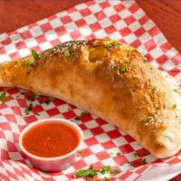 Buffalo Chicken Calzone · A baked or fried turnover of pizza dough stuffed with savory fillings.