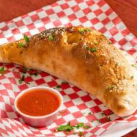 Red Onion Calzone · A baked or fried turnover of pizza dough stuffed with savory fillings.