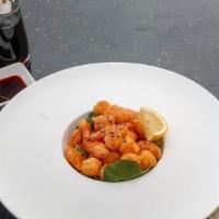 Rock Shrimp · Deep fried popcorn shrimp glazed with chef's special sauce.