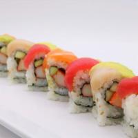 Rainbow Roll · Kani, avocado, cucumber inside, topped with fund, salmon, yellowtail, white fish and tobiko.