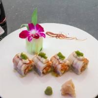 Mamamia Roll · Spicy crunchy shrimp and avocado inside, topped with seared white tuna wasabi tobiko served ...