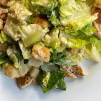Caesar Salad · ROMAINE, GRANA PADANO WITH A LIGHT SAUCE CAESAR DRESSING TOPPED WITH CROUTONS