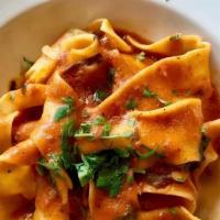 Pappardelle Bolognese · Ribbon pasta, slowly braised pork and beef ragu, in a classic bolognese sauce