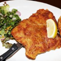 Pollo Alla Milanese · Lighlty breaded pan roasted chicken breast served with a mixed green salad