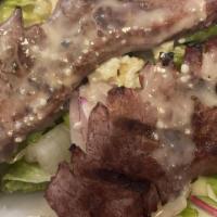 Steak Salad · Black angus steak, onions, asparagus, olives, gorgonzola cheese and lemon vinaigrette.