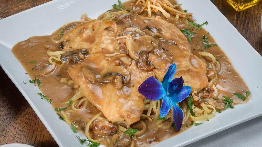 Chicken Marsala · Sauteed in a marsala wine sauce with fresh mushrooms. Served with your choice of side.