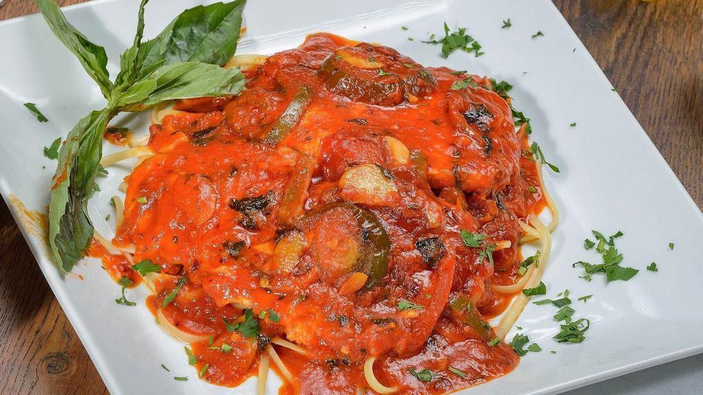 Chicken Fra Diavolo · Chicken breast sauteed in a spicy fra diavolo sauce. Served with your choice of side.