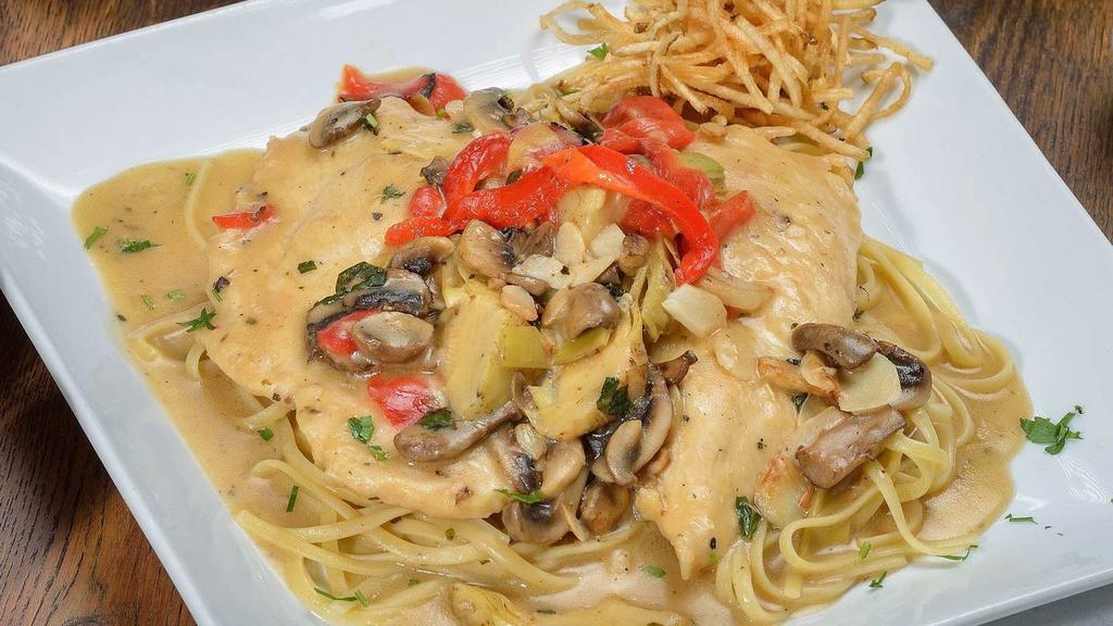 Chicken Mediterranean · Chicken breast sauteed in lemon, white wine sauce with artichoke hearts, mushrooms and roasted peppers. Served with your choice of side.