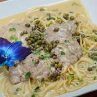 Veal Picatta · Sauteed with capers in a white wine sauce. Served with your choice of side.