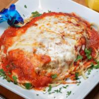 Eggplant Parmigiana · Lightly breaded skinless eggplant covered with tomato sauce and mozzarella. Served with your...