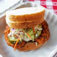 Sandwich · Boneless white breast sandwiched between four slices of white bread, topped with Ma’s Slaw a...