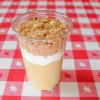 Miss B'S Banana Pudding · Made using real bananas, topped with whipped cream, toasted cookie crumble and a touch of se...