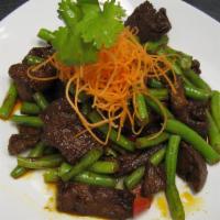 (L)Prik Khing · Served with Jasmine Rice. Red pepper, string bean and kaffir lime leaves.