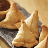 Vegetable Samosa · 3 piece. Serve with tamarind and mint sauce.