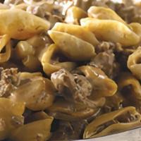 Butcher’S Mac · Shell pasta mixed with chef’s special blend. Grass-fed New York strip steak, smoked bacon la...