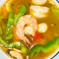 Tom Yum Gung · Hot & Spicy.  Hot & sour lemongrass broth w. shrimp, bell peppers & mushroom.