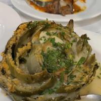 Stuffed Artichoke · Vegetarian. Baked with breadcrumbs, oregano, parsley, and grated parmigiano cheese in an Ita...