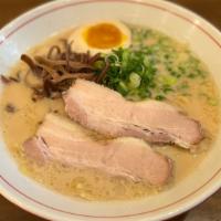 Shoyu Pork Ramen · Wavy, thick egg noodles in a soy sauce-based 