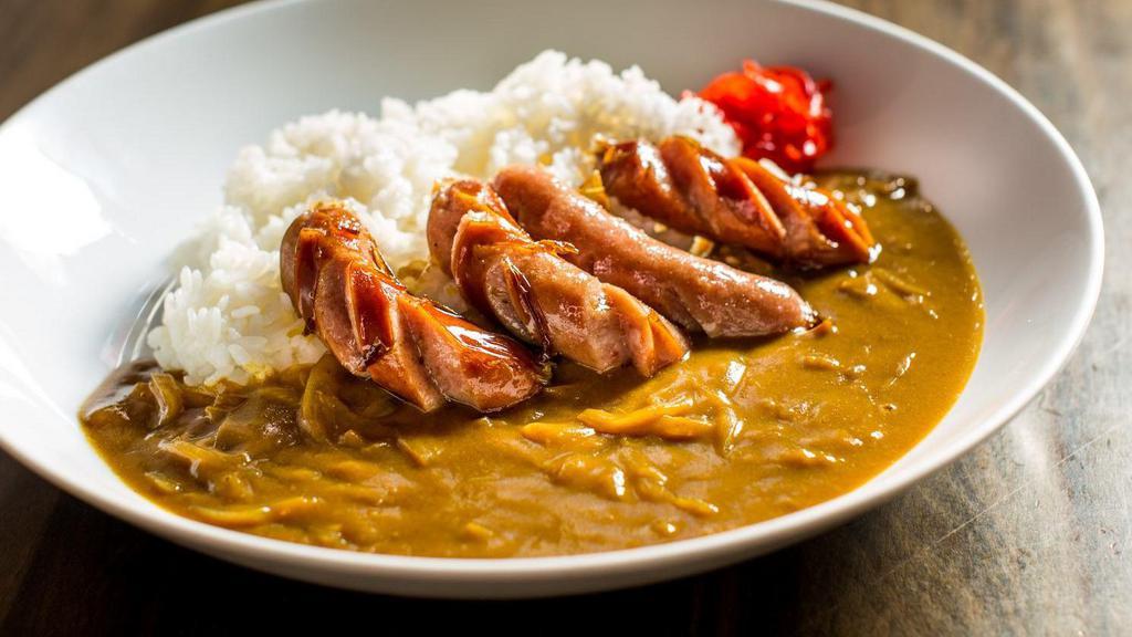 Pork Sausage Curry · Berkshire pork sausage, curry sauce on the rice