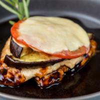 Chicken Russo · Eggplant, tomatoes, artichokes, mozzarella, port wine reduction.