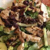 Grilled Chicken Salad · Romaine lettuce, cherry tomatoes, walnuts, dried cranberries.