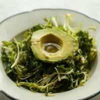 Kale Zinger Salade · Whole leaf kale, half avocado and basil dressing.