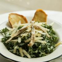 Caesar Salade · Shredded kale salad, anchovy dressing and Parmesan.