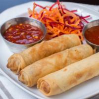 Crispy Spring Rolls · Shredded cabbage and carrots with corn, peas and mushrooms: sweet chili sauce.