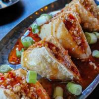 Crusted Triangle Tofu · sweet chili sauce, crushed peanuts and scallions