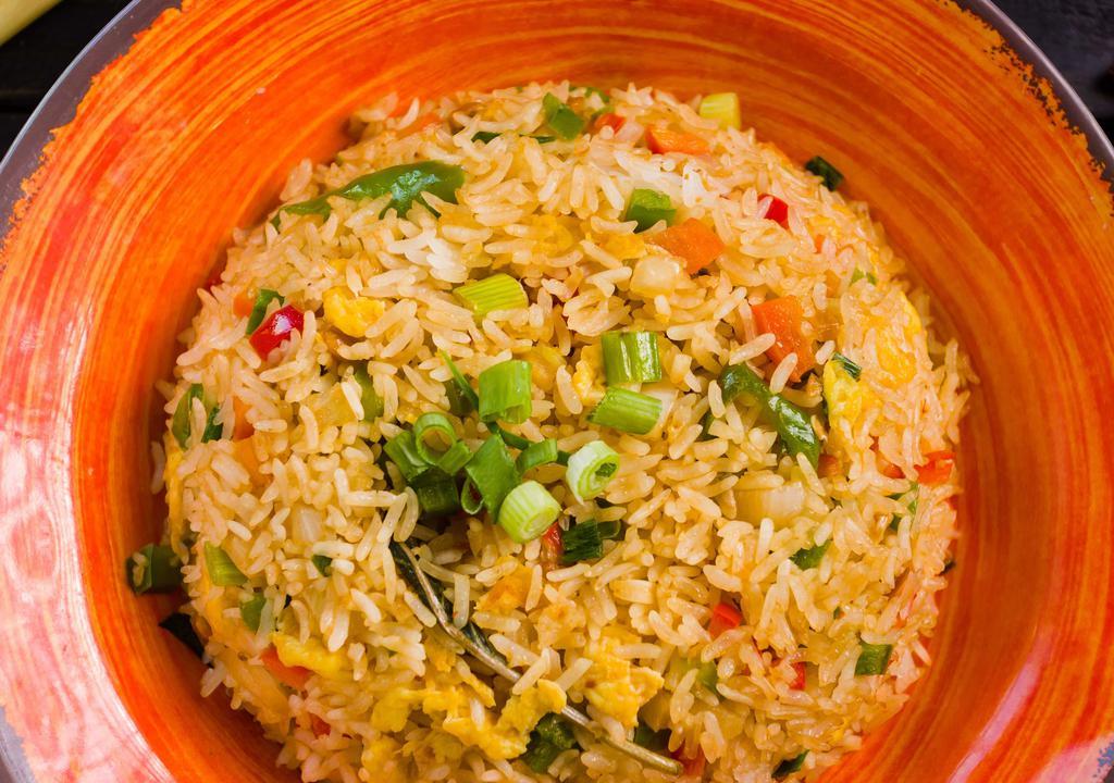 House Fried Rice · Garlic onions scallions tomatoes eggs.