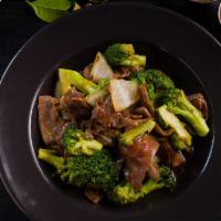 Thai Beef & Brocolli · Marinated tender flank steak stir fried-oyster sauce-garlic.