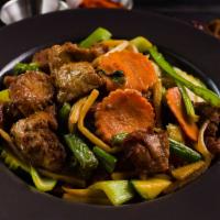 Stir Fried Vegetarian Duck · vegan mock duck flavored wheat gluten in a soy reduction with scallion, greens and veggies