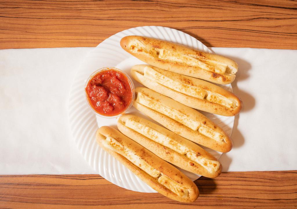 Cheesy Stuffed Breadsticks · Our delicious breadsticks stuffed with cheese. Served with marinara sauce.