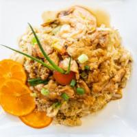 Sopah Fried Rice · Our special shrimp and chicken fried rice topped with delicious garlic pepper pork.