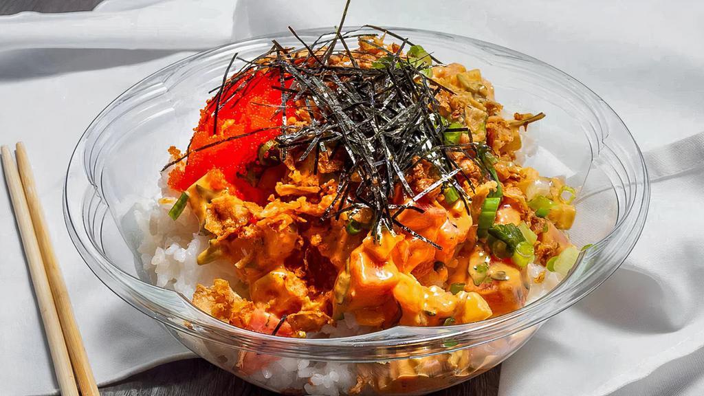 Hawaiian · Wild-caught ahi tuna, sweet onions, and cilantro tossed in spicy mayo, and topped with masago green onions, shredded nori, and crispy onions.