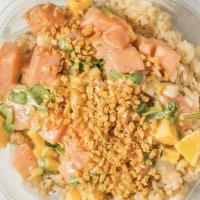 Miso Salmon · Salmon, sweet onions, diced mangoes, and cilantro tossed in creamy miso, and topped with gar...