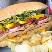 Classic Italian Sub · Vegan mayo, mustard, turkey, salami, lettuce, tomato, red onion, mild banana peppers, oregan...