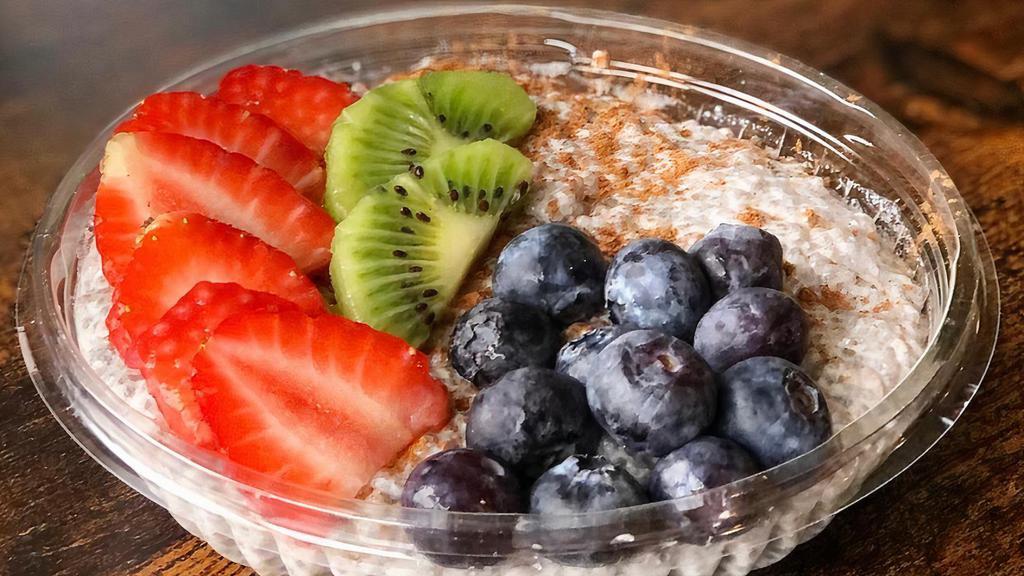 Vanilla Cinnamon Chia Pudding · Gluten free. Chia seeds, agave, vanilla extract mixed into a creamy coconut milk base - topped with cinnamon and fresh fruit (strawberries, blueberries and kiwis).