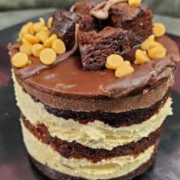 Reese'S Peanut Butter  Individual Cake · Mini chocolate cake rounds and fudge brownies filled with creamy peanut butter mousse, toppe...