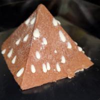 Chocolate Pyramid · Chocolate mousse on a chocolate sponge cake base with crunchy chocolate and hazelnut center,...