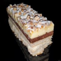 Hazelnut Cake  · Alternating layers of hazelnut cake, hazelnut cream and chocolate cream, topped with praline...