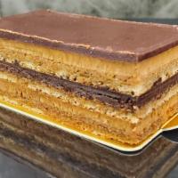 Opera · 7 layers of almond sponge cake, French decadent buttercream, and rich chocolate ganache