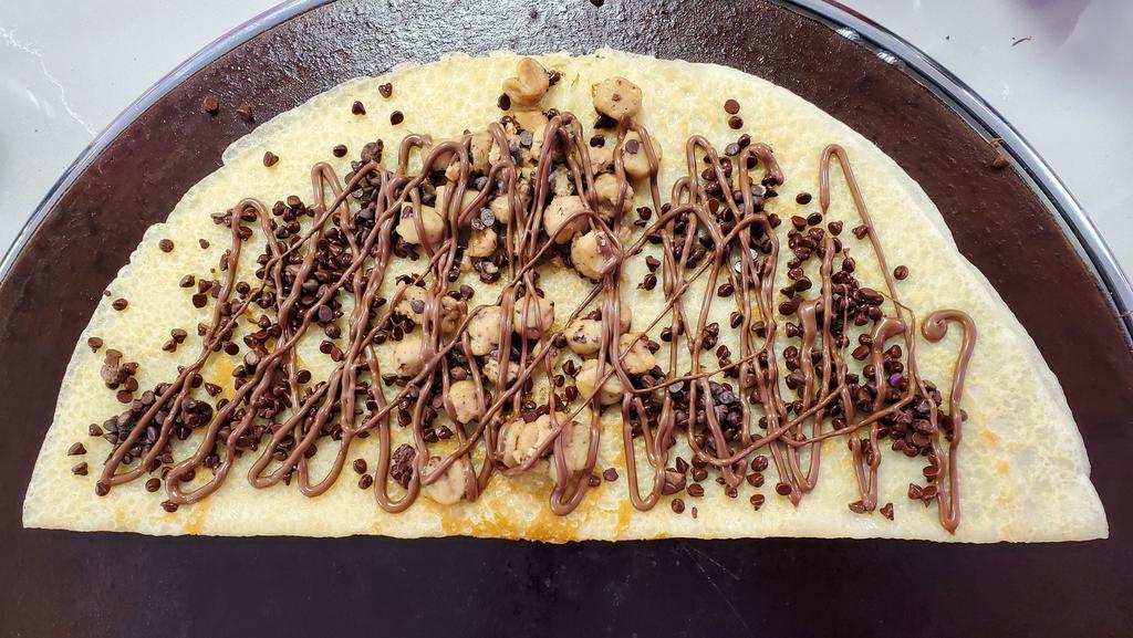 Half Baked Crepe · Nutella, cookie dough and chocolate chips  w/ powdered sugar