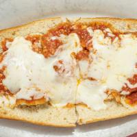 Chicken Parmigiana · Breaded breast of  chicken topped with tomato sauce & melted mozzarella cheese.