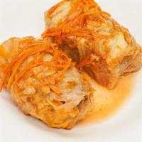Stuffed Cabbage(1 Pc) · Cabbage leaves, rice, ground beef, mix pepper, dill, carrots, onion, and spices.