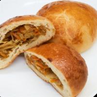 Pirozhki With Cabbage(1 Pc) · Cabbage, carrots, flour, eggs, salt, oil, and yeast.